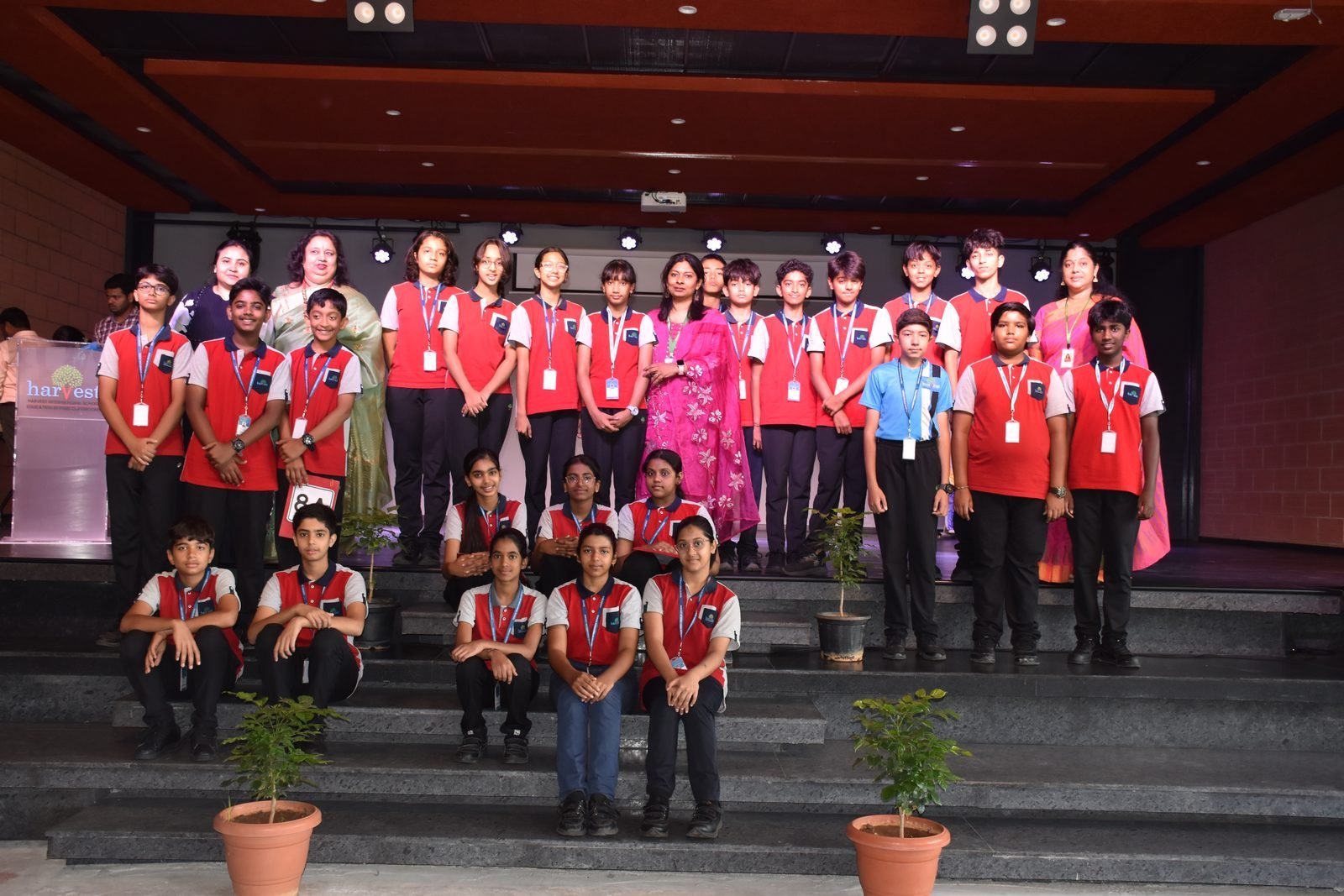 Students on the green campus of Harvest International School